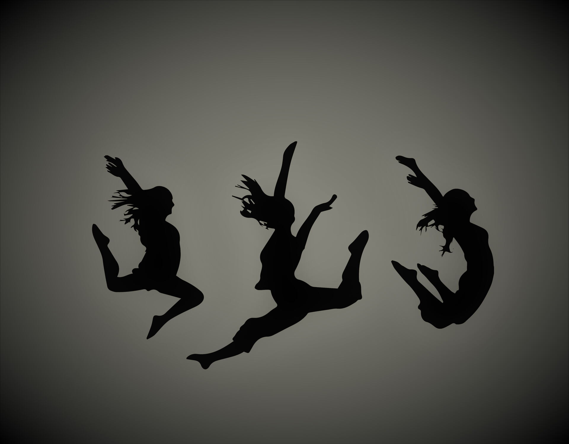 Silhouetten springender Tänzerinnen